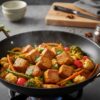 Recette wok de filet mignon de porc au curry de légumes